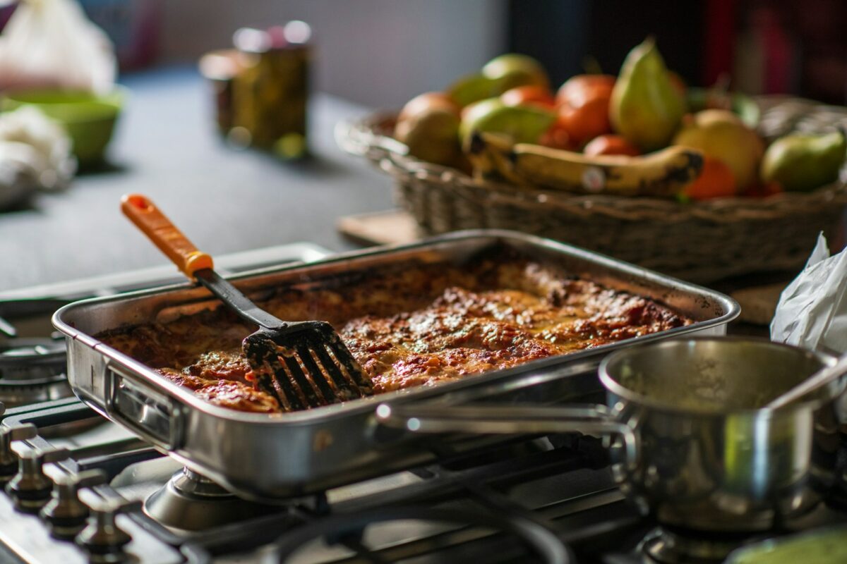 a close up of a pan of food on a stove